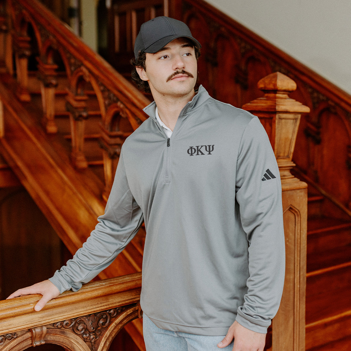 Phi Kappa PsiFraternity Grey Adidas Lightweight Performance 1/4 Zip with Greek letters.