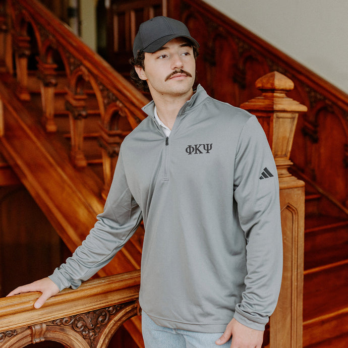 Phi Kappa PsiFraternity Grey Adidas Lightweight Performance 1/4 Zip with Greek letters.