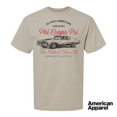 Beige T-shirt displayed on a plain background with a vintage-inspired graphic of a classic muscle car, mixed typography, and a soft red and black print design.