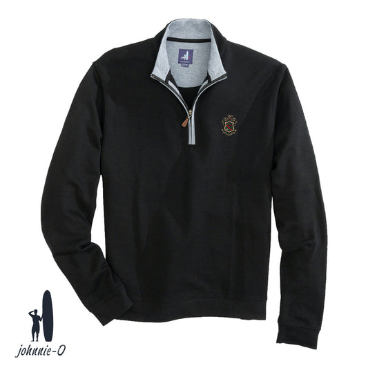 A black johnnie-O quarter-zip pullover with a gray collar and leather zipper pull, featuring an embroidered fraternity crest on the left chest. Displayed on a white background with the johnnie-O logo in the bottom corner.