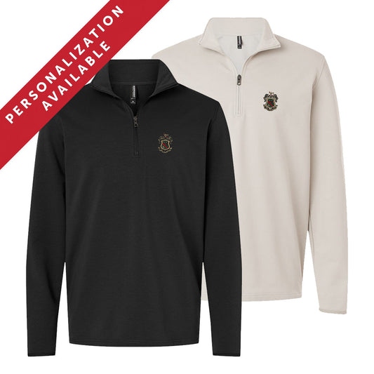 Two Phi Kappa Psi Embroidered Luxe Quarter Zips in black and smoke colors with crest embroidery on the left chest. Banner reads Personalization Available.