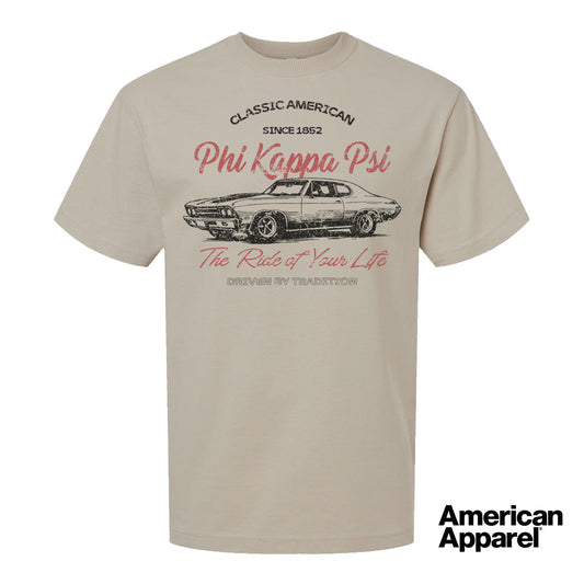 Beige T-shirt displayed on a plain background with a vintage-inspired graphic of a classic muscle car, mixed typography, and a soft red and black print design.